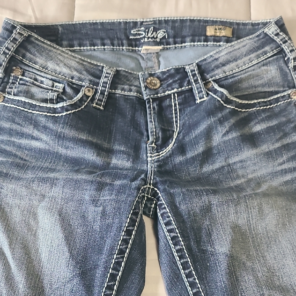 Silver Jeans Blue Boot Cut Denim with Vintage Distress